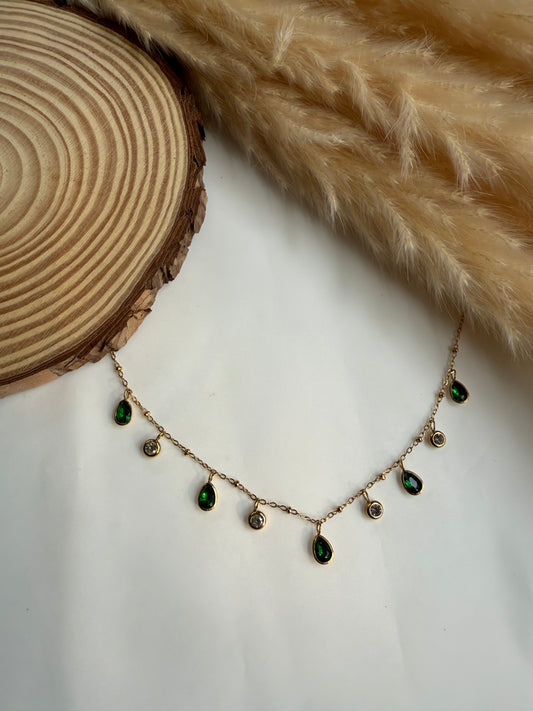 Green and white charm necklace