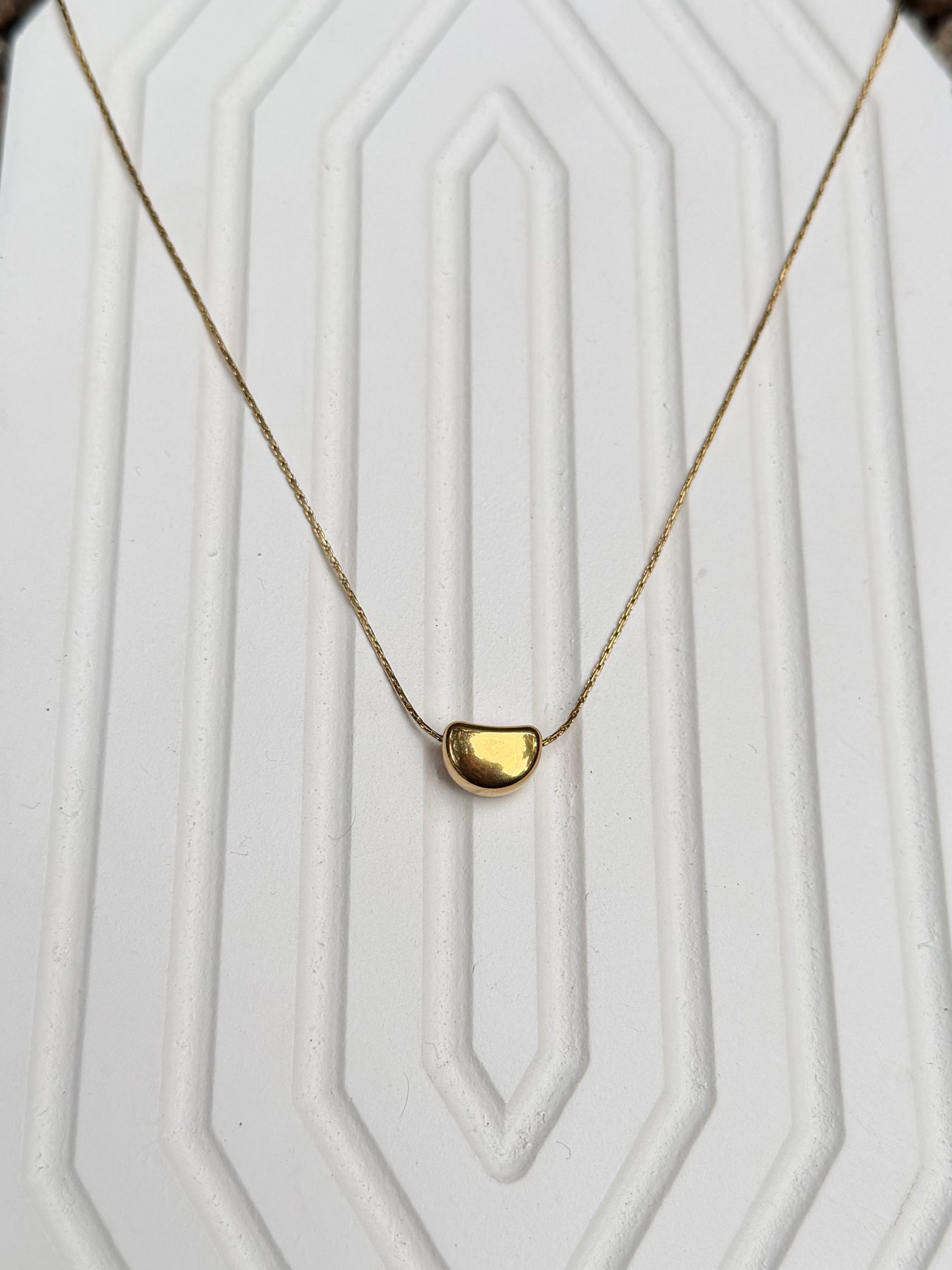 Movable pendant chain